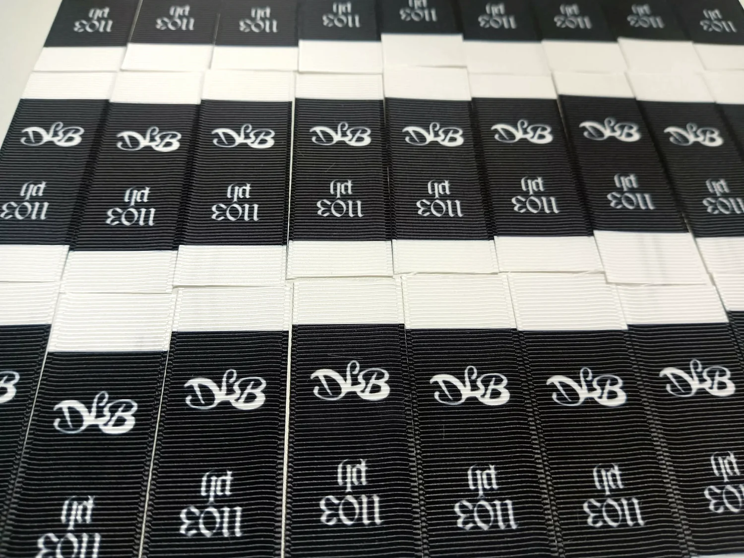 Grosgrain Neck / Brand Tag · 1 × 2 in · Landscape